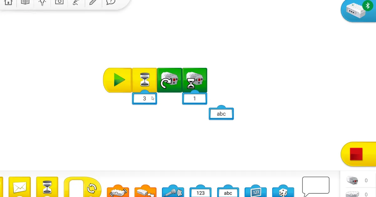 Среда программирования WeDo 2.0: холст с цепочкой блоков и палитра внизу экрана приложения